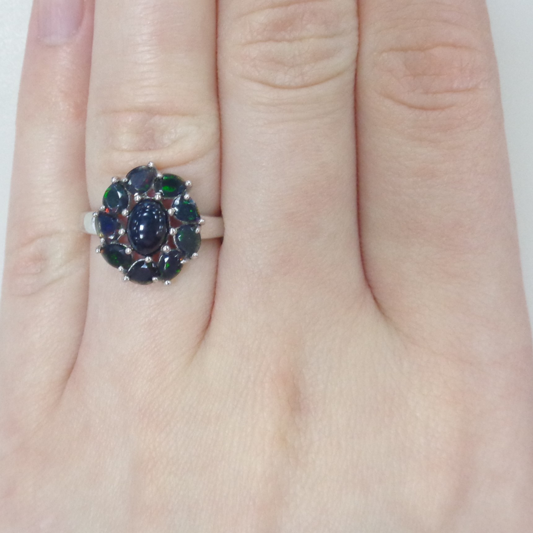 Серебряное кольцо с черными опалами "Цветок"